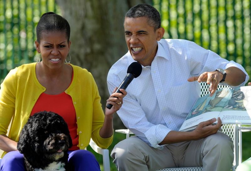 Michelle and Barack Obama reading a story at the White House during the Easter Egg Roll in April 2012 (AP Photo/Susan Walsh)